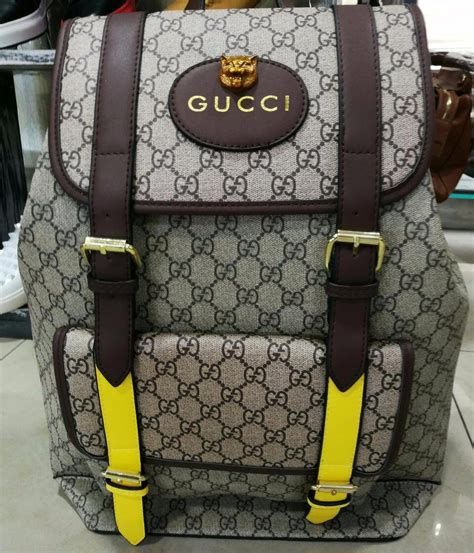 bolsas gucci para hombre.